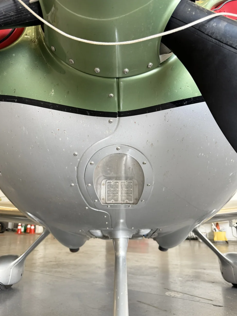 Before detailing: bug residue on the Cirrus SR22 nose